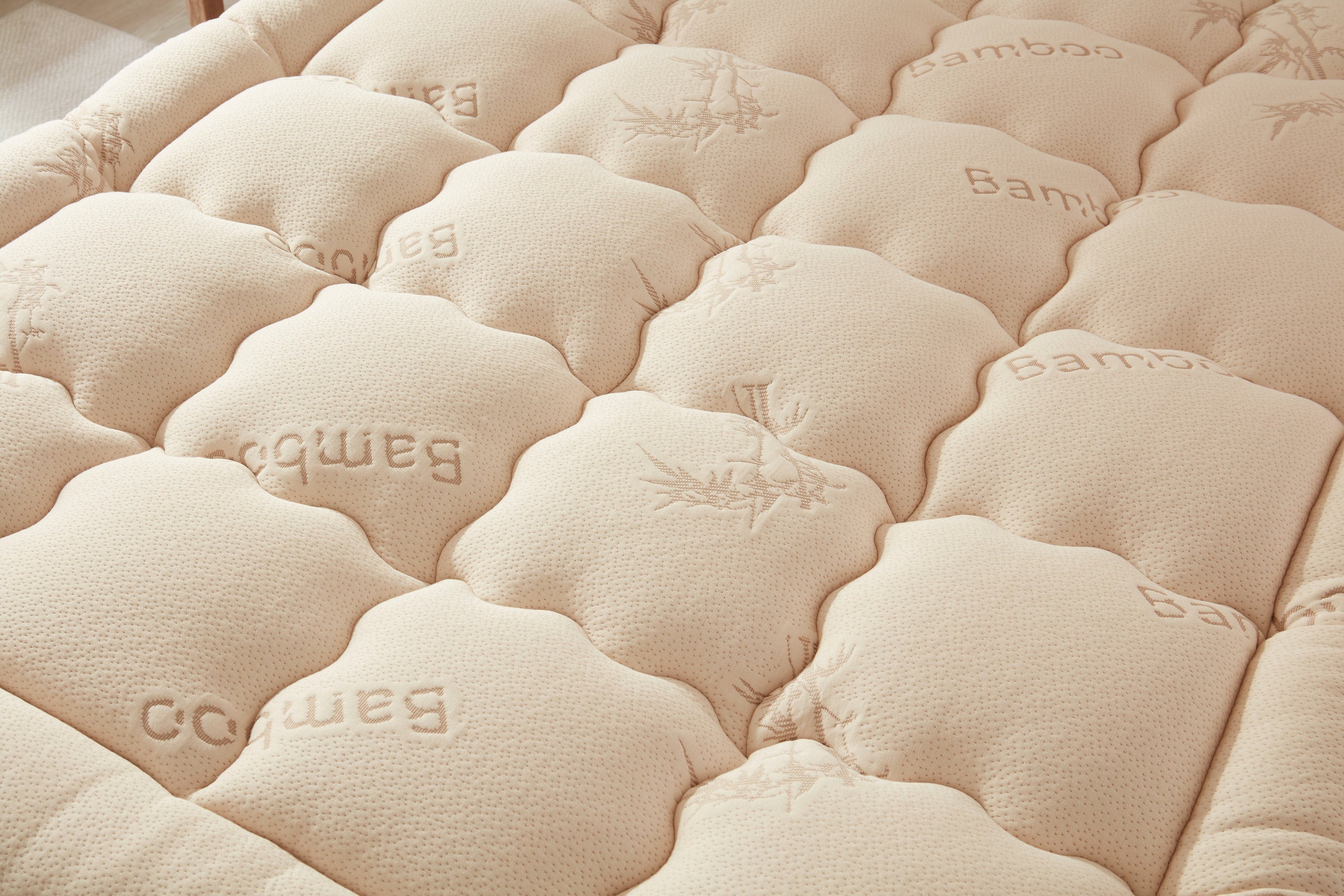 Close-up of the Bedlore bamboo topper's quilted fabric texture