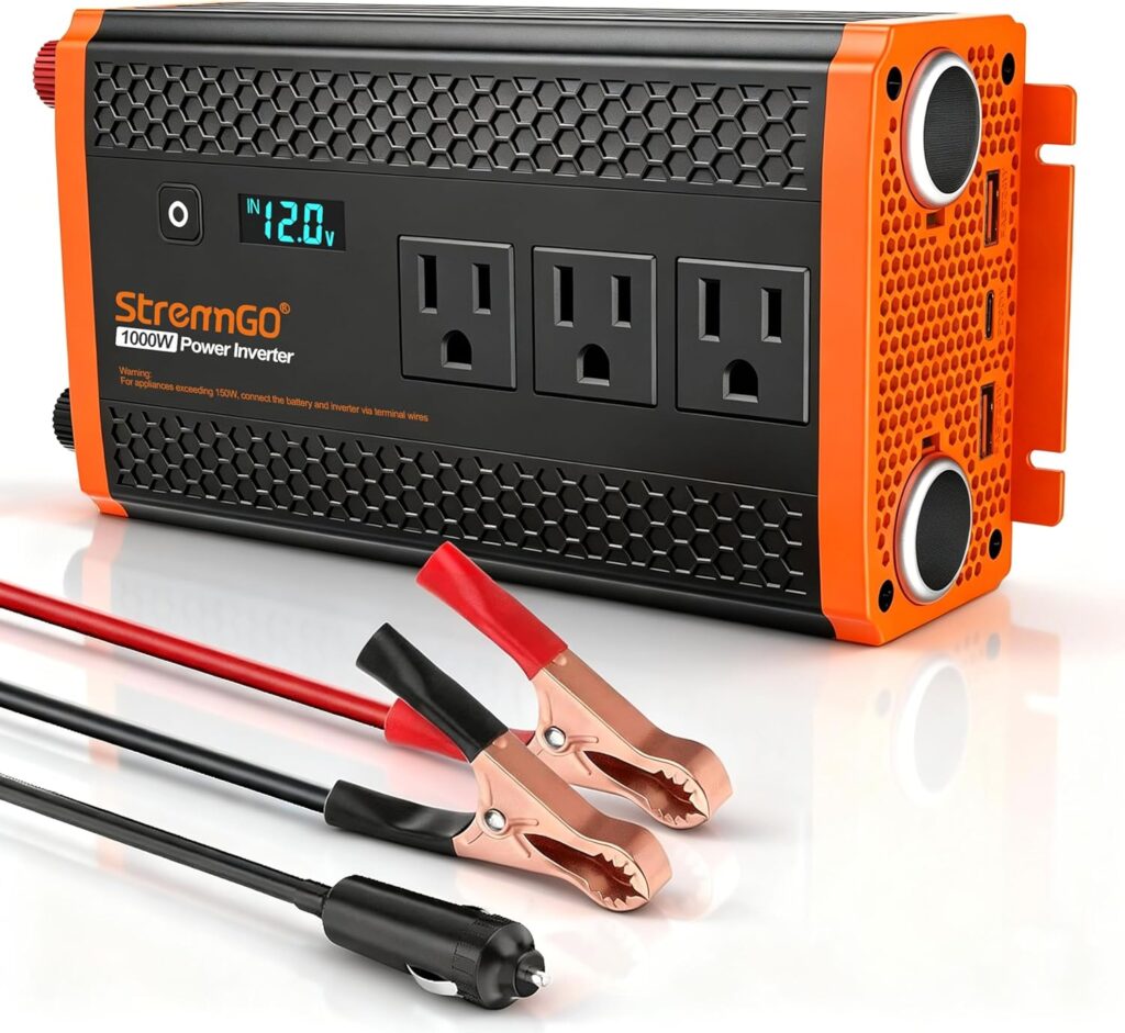 StrenrmGO 1000W Power Inverter with 3 AC outlets, LED voltage display, USB-C and USB-A ports, and battery clamp cables